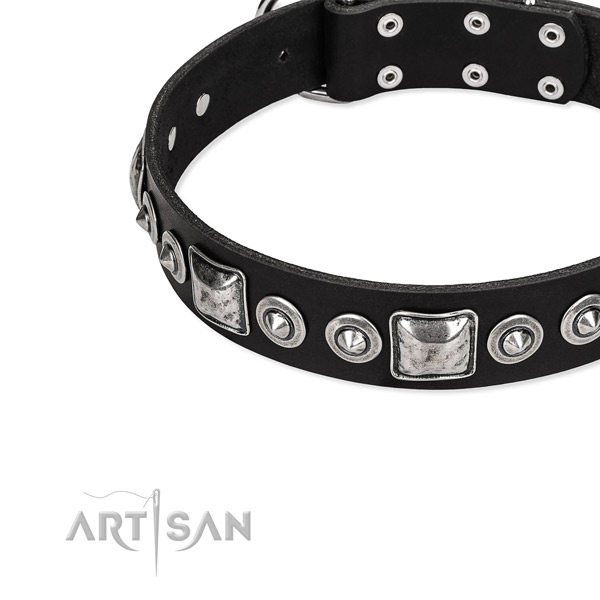 Full grain leather dog collar made of gentle to touch material with studs